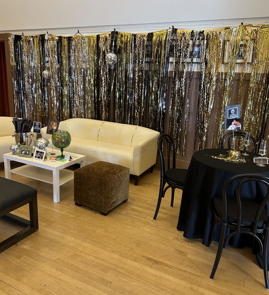 Clubhouse auditorium decorated with metallic fringes and sofas
