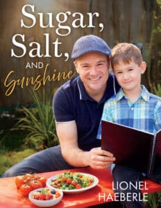 Front cover of a cook book showing a father and young son